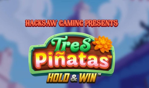 Pantalla de la tragamonedas Tres Pinatas Hold & Win, con piñatas en forma de calavera de azúcar en un tema de Día de Muertos