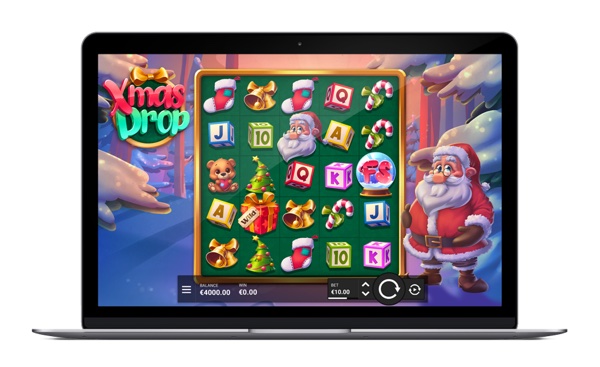 Santa Claus salvaje expandiendo símbolos y regalos con multiplicador en la tragamonedas navideña Xmas Drop, de Hacksaw Gaming